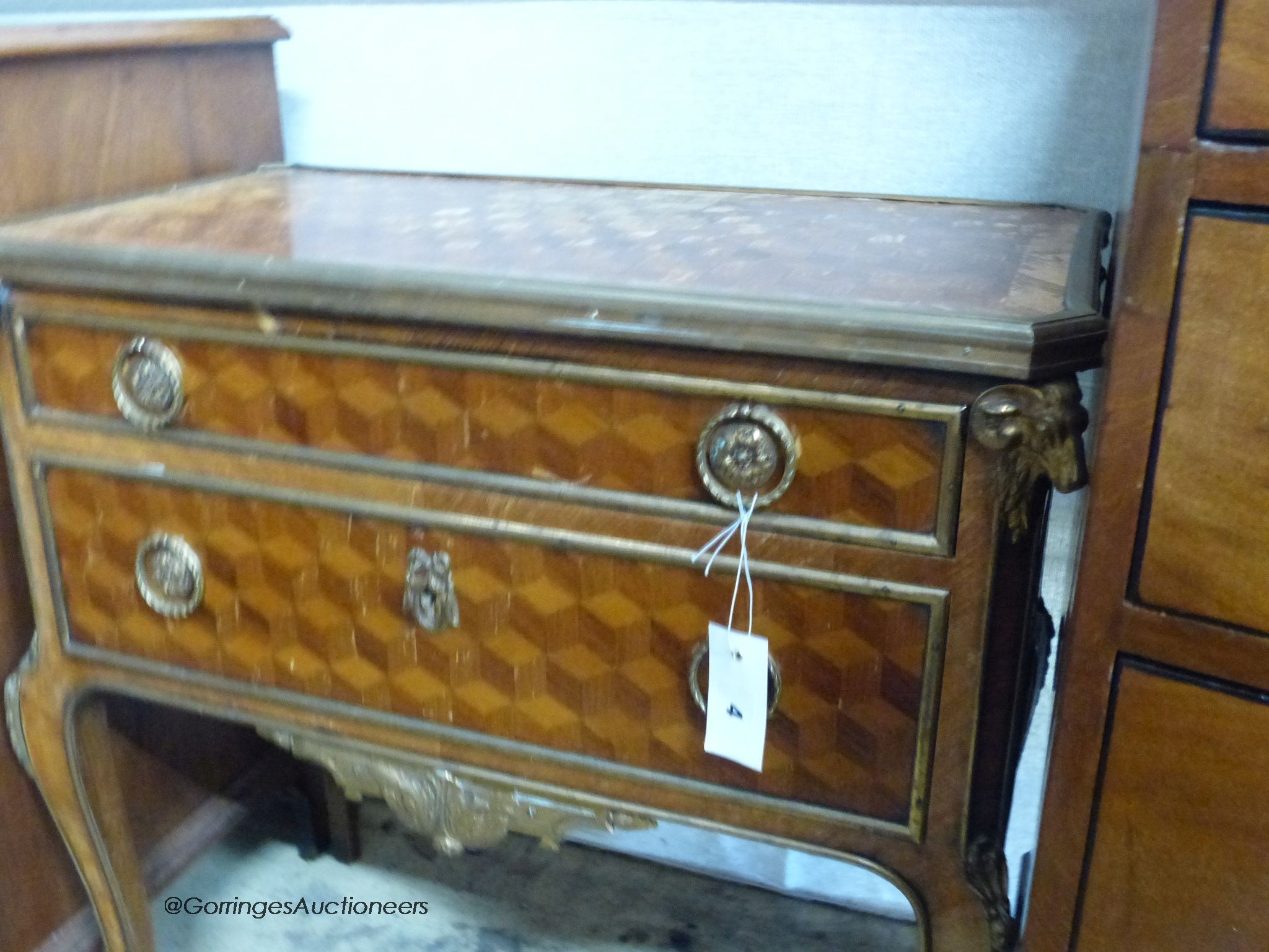 A French transitional style parquetry inlaid two drawer chest, width 65cm, depth 36cm, height 68cm